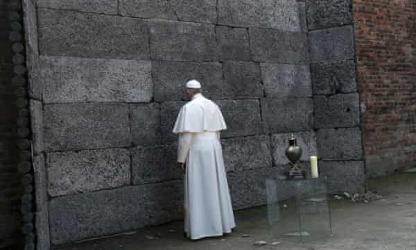 Pope Francis pays his respects at the ‘wall of death’.