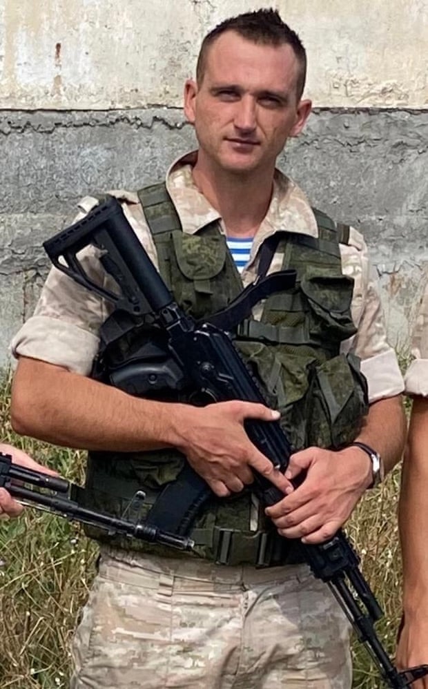 Filtayev posing with a rifle