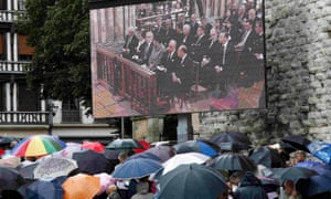 Mourners gather near a giant screen outside Rouen cathedral for the funeral service in memory of Father Jacques Hamel
