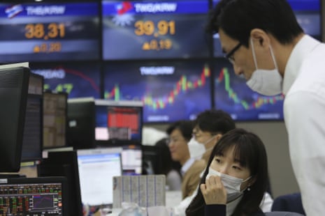 Currency traders at the foreign exchange dealing room of the KEB Hana Bank headquarters in Seoul, South Korea.