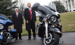 Donald Trump and Vice-President Mike Pence joke at a meeting at the White House with representatives of Harley-Davidson in February 2017.
