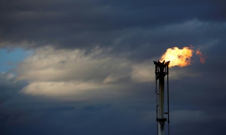 FILE PHOTO: A flare burns off excess gas from a gas plant in the Permian Basin in Loving County, Texas, U.S., November 21, 2019. REUTERS/Angus Mordant/File Photo