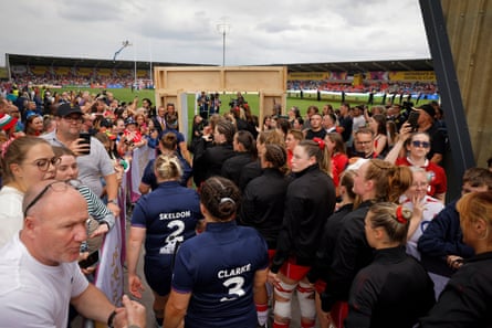 The Scotland and Wales teams line up in the temporary tunnel