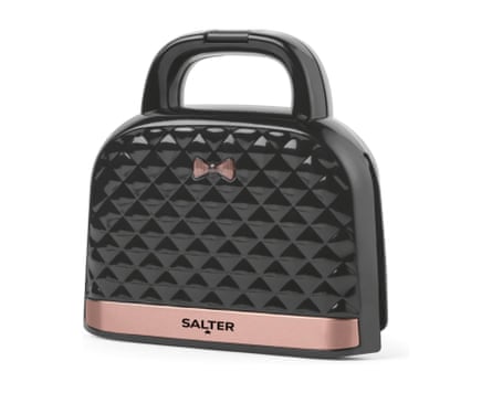 A Salter Handbag Toastie Maker – which is a handbag shaped toastie maker with a textured surface and small bow detail.