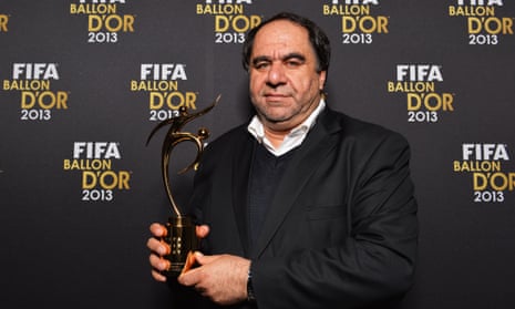Keramuudin Karim poses with the Fifa fair play award after the 2013 Ballon d’Or gala, held in January 2014