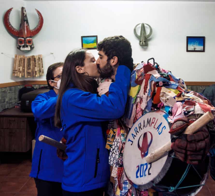 Ernesto Antonio Salgado gets a good luck kiss from his girlfriend, Paula, before heading out to face the turnip-wielding crowds