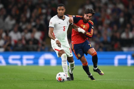 Ezri Konsa is challenged by Ferran Torres at Wembley