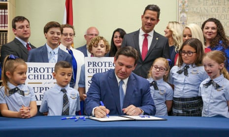 Florida governor Ron DeSantis signs the Parental Rights in Education bill on 28 March 2022, in Shady Hills, Florida.