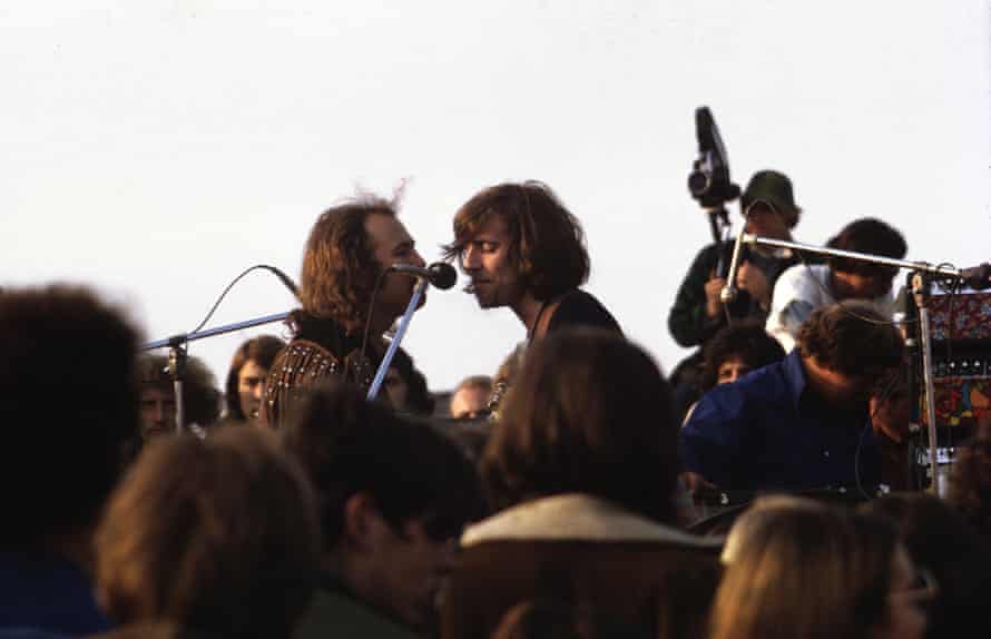 Nash with David Crosby, performing at Altamont in 1969.