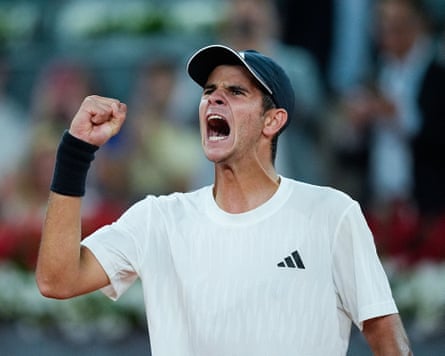 Spain’s Rafael Jodar celebrates aft beating a top-10 subordinate for nan first clip pinch triumph complete Australia’s Alex de Minaur successful Madrid