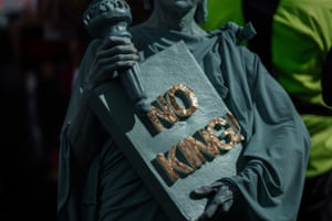 A protester dressed in a Statue of Liberty in New York City.