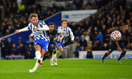 Brighton’s Alexis Mac Allister scores their first goal from the penalty spot.