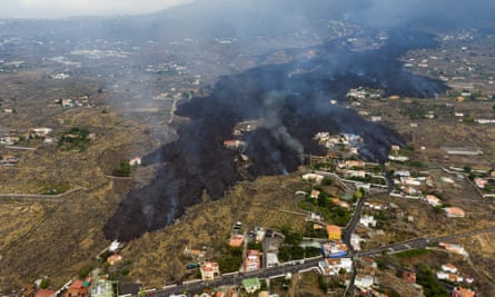 Lava destroying houses on the island of La Palma.