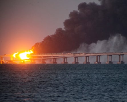 A fire and black smoke rising from the Kerch bridge