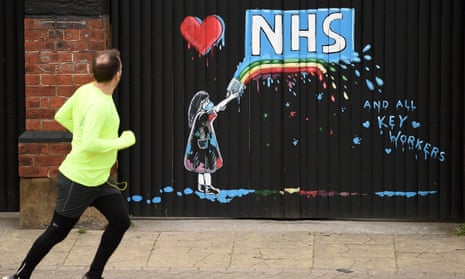 The NHS and key workers are thanked in an artwork on the gates of a closed pub in April. 