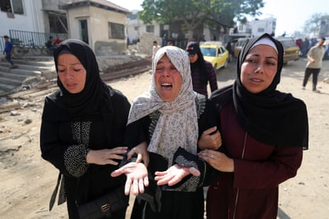 Women mourn during the funeral of Palestinians killed on Friday in Israeli airstrikes, according to Gaza’s health ministry, at Al-Shifa Hospital, in Gaza City, 28 June 2025.