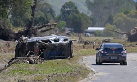 An overturned car in the aftermath of Cyclone Gabrielle