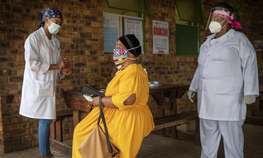 A woman is briefed before taking a Covid-19 test at the Ndlovu clinic in Groblersdal, South Africa.