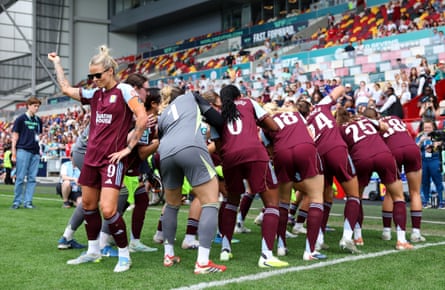Rachel Daly (left) and Aston Villa dance their way to the pitch