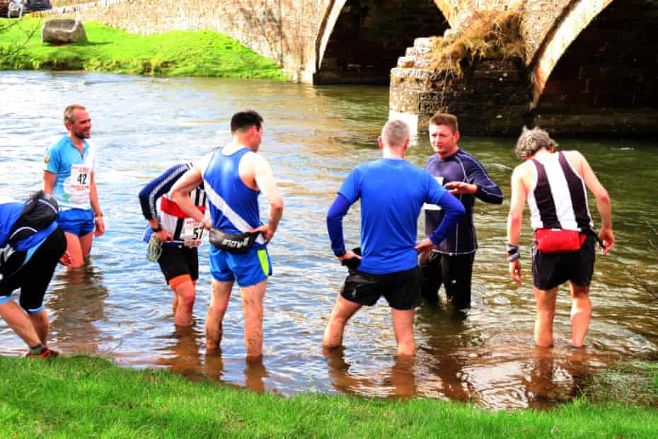 Fell runners revive in the beck after running Jarrett’s Jaunt in March 2017.