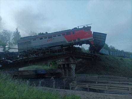 The freight train at the scene after a railway bridge collapsed in the Kursk region