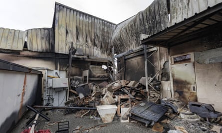 A burnt building in Magenta, Noumea, in the aftermath of riots in the New Caledonia capital.
