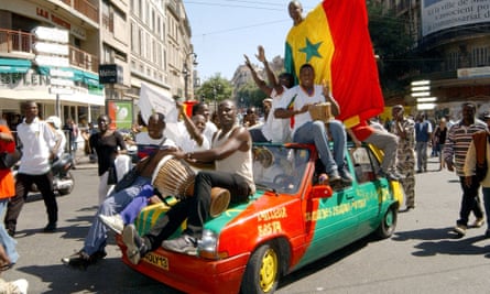 Senegal supporters celebrate in central Marseille after their country’s victory over France in the 2002 World Cup’s opening game on 31 May