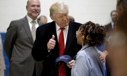 Donald Trump with a Carrier worker. Trump sued the company in 2007 over a faulty air-cooling system at his New York hotel.