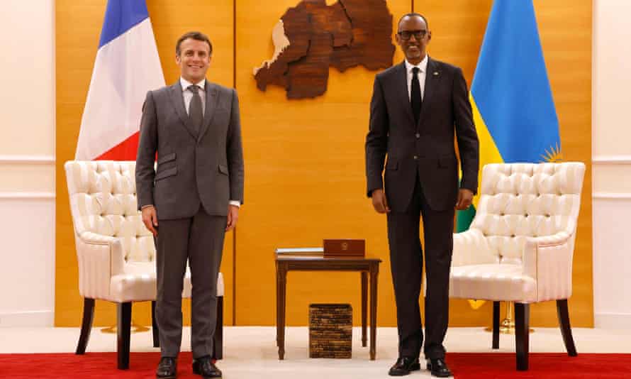 Emmanuel Macron (left) and Paul Kagame pose for the photographers at the presidential palace prior to their talks in Kigali.