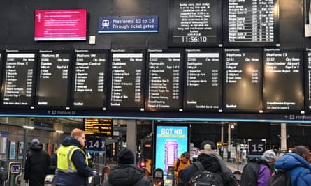 Passenger information boards at Edinburgh Waverley station announce the cancellation of services due to Storm Jocelyn