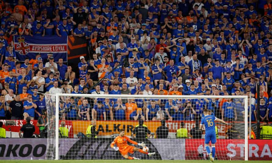 Rangers' Aaron Ramsey has his shot saved by Eintracht Frankfurt's Kevin Trapp.
