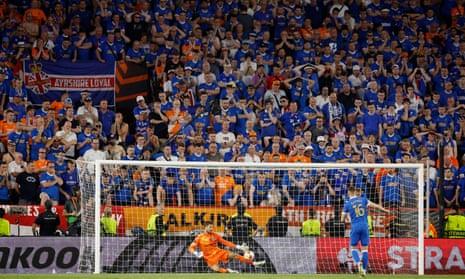 Rangers’ Aaron Ramsey has his shot saved by Eintracht Frankfurt’s Kevin Trapp.