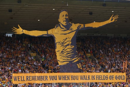 A tifo dedicated to former Wolves player Diogo Jota is displayed by supporters at Molineux