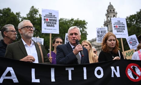 Labour’s John McDonnell (centre) with former Labour leader Jeremy Corbyn (left) at a Stop the War coalition protest in August 2021