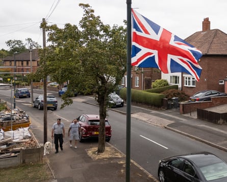 The union flag above a suburban street.