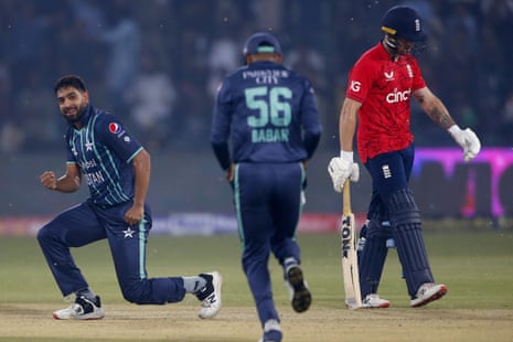 Pakistan’s Haris Rauf (left) celebrates after taking the wicket of England’s Phil Salt (right).