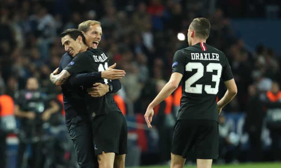 Thomas Tuchel celebrates with Ángel Di María after his goal against Napoli in the Champions League.