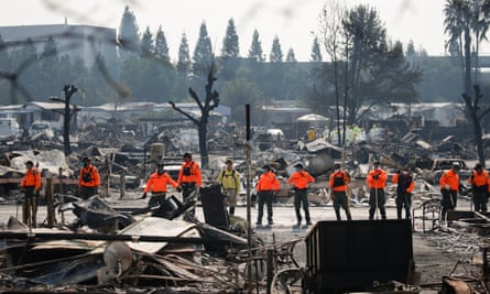 Search and rescue personnel look for human remains in the Journey’s End Mobile Home park following the damage caused by the Tubbs fire.