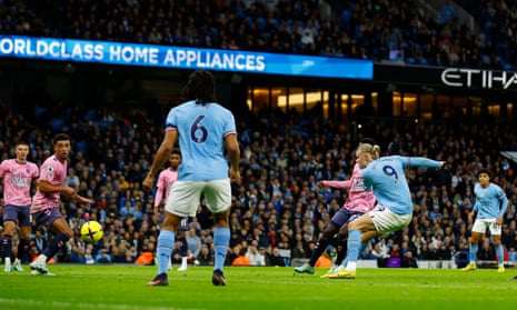 Manchester City’s Erling Haaland scores their first goal.