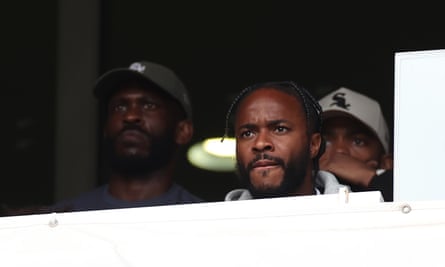 Raheem Sterling watches Arsenal play against Brighton