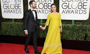 Natalie Portman in vintage Prada, with her husband, the choreographer Benjamin Millepied, at the Screen Actors Guild awards.