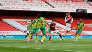 Arsenal’s Emile Smith Rowe scores their first goal.