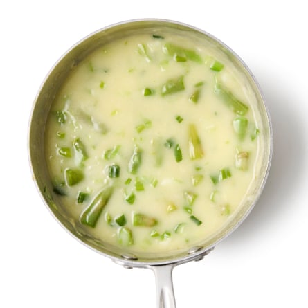 Add the chopped stem tops to the pan, turn down the heat slightly and simmer gently for eight minutes.