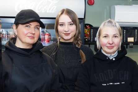 Hanna, Daria and Ludmila pose for a portrait