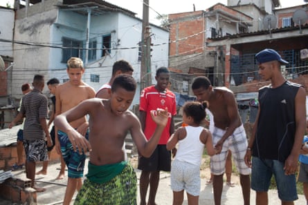 Young men dancing Rio’s Vila Valqueire neighbourhood. 