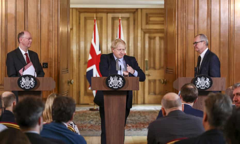 Boris Johnson flanked by Chris Whitty and Patrick Vallance during a news conference unveiling coronavirus emergency plans.