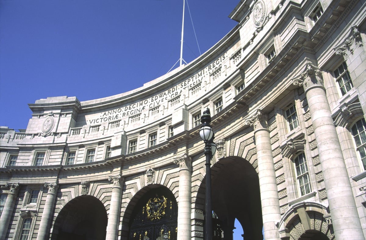 The historic Admiralty Arch against a blue sky.