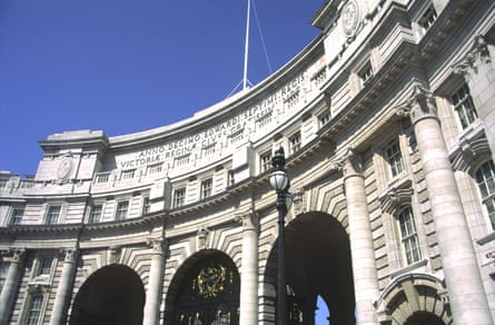 The historic Admiralty Arch against a blue sky.
