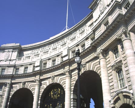 The historic Admiralty Arch against a blue sky.