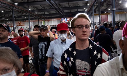 Supporters wait for Donald Trump during an indoor campaign rally at Xtreme Manufacturing in Henderson, a suburb of Las Vegas, Nevada.